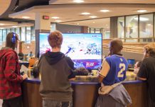 Students play Super Smash Bros. in the Student Center.