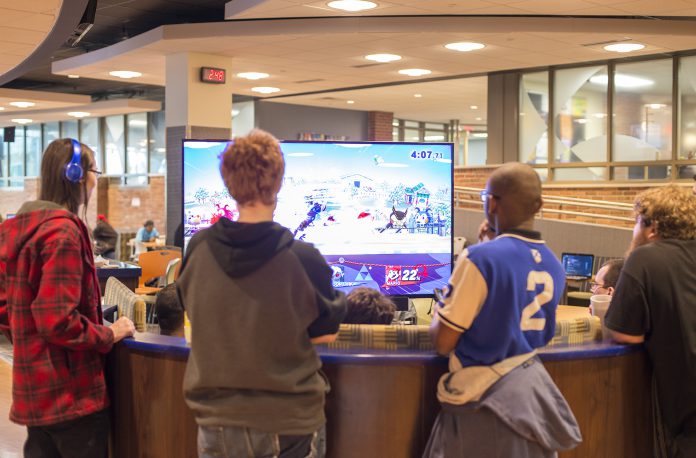 Students play Super Smash Bros. in the Student Center.