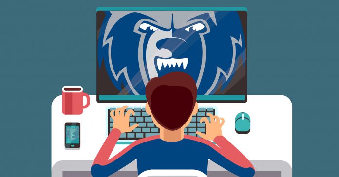 Illustration of a student working on a computer. A Bruin head logo is on the screen.