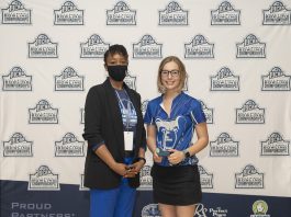 Kellogg Community College bowler Kelsey Kipp poses with KCC President Dr. Adrien Bennings with an award following the NJCAA Championship in Lansing. Photo courtesy of KCC.