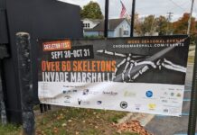 A sign depicting the information about marshall's skeleton fest