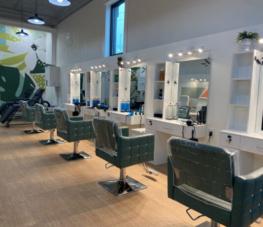 An interior view of an empty hair salon.