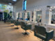 An interior view of an empty hair salon.
